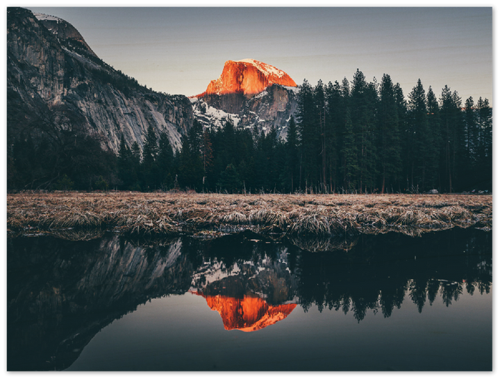 Captivate your space with the breathtaking beauty of the Yosemite Sunset Print from Metalplex. This stunning metal wall art captures the vibrant hues of a Yosemite sunset, bringing nature&